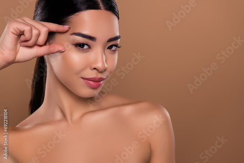 Obraz na plátně Photo of gorgeous lady fingers touch face lifting collagen mask soft cream isola