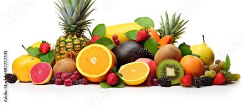 Assortment of exotic fruits in basket isolated on white. Copy space image. Place for adding text or design
