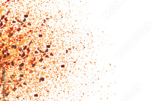  dry organic kashmiri red chili pepper flakes powder burst texture on cutout transparent background,png format,selective focus,top view,text copy space photo