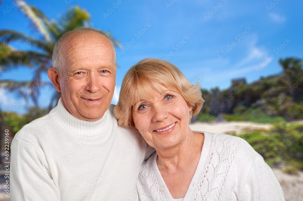 Happy senior couple travel on beach vacation.