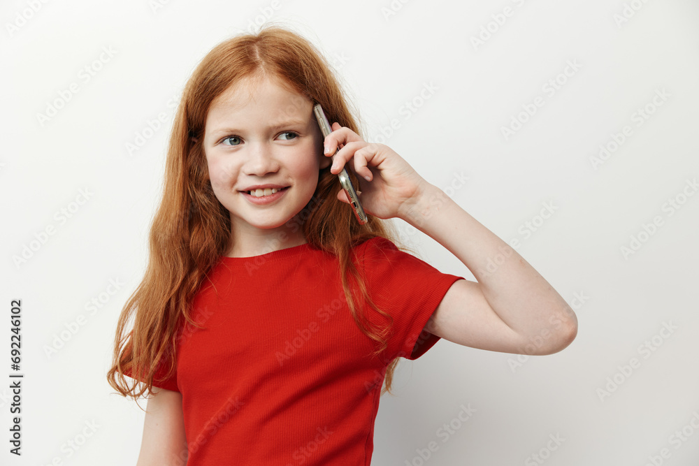 Face caucasian phone kid technology children girl female little cute person young Face caucasian phone kid technology children girl female little cute person young