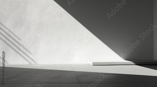 Minimalist gray wall capturing the interplay of shadows and light in exquisite detail.