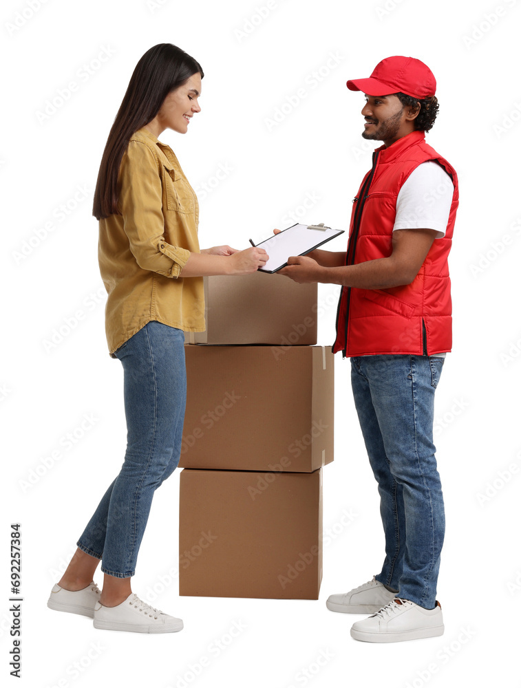 Smiling woman signing order receipt on white background. Courier delivery