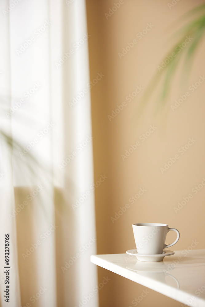 A cozy, bright room with sunlight streaming in. A cozy, bright room with sunlight streaming in.