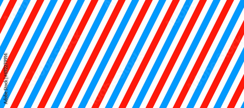 Barber shop pole background. Abstract diagonal line seamless pattern. Striped repeating wallpaper. Red, white and blue candy cane repeated texture. Vector wrapping paper backdrop. 