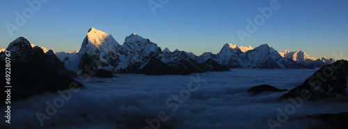 High mountains Cholatse, Kantega, Thamserku and Kusum Kanguru seen from Gokyo Ri, Nepal. photo