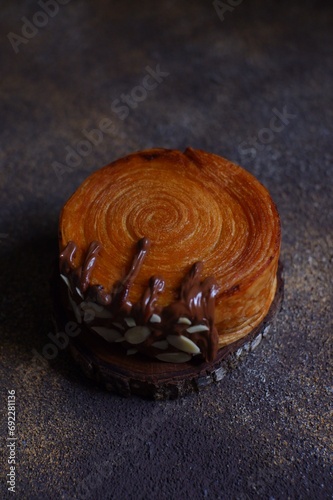 cromboloni pastry in dark background  photo