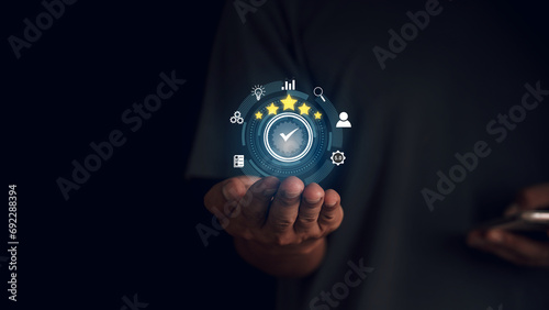 Quality Assurance Concept. Business people show high quality assurance mark, good service, premium, five stars, premium service assurance, excellence service, high quality, business excellence.