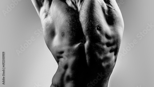 Strong Sexy Athletic Man. Fitness Model showing naked Torso. Cropped photo with naked male body for banner. Sexy man for design. Gay poster. Templates lgbt web banner design.