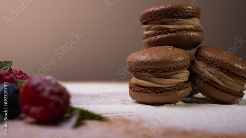 chocolate desserts on a light background close-up, with raspberries and blueberries. Christmas festive background