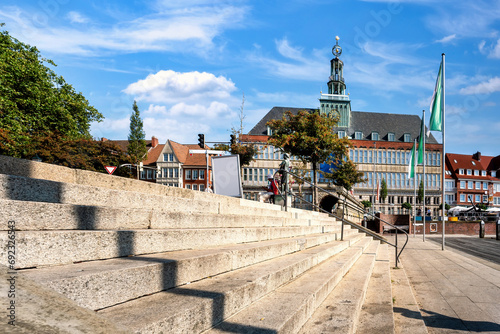 Cityscape of Emden with promenade and town hall, Germany