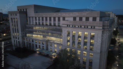 United States government building at night. Aerial view of large federal building in American city during dusk. photo