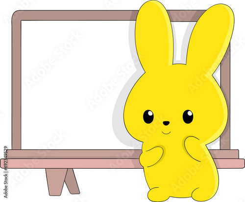 yellow rabbit with a teaching board behind