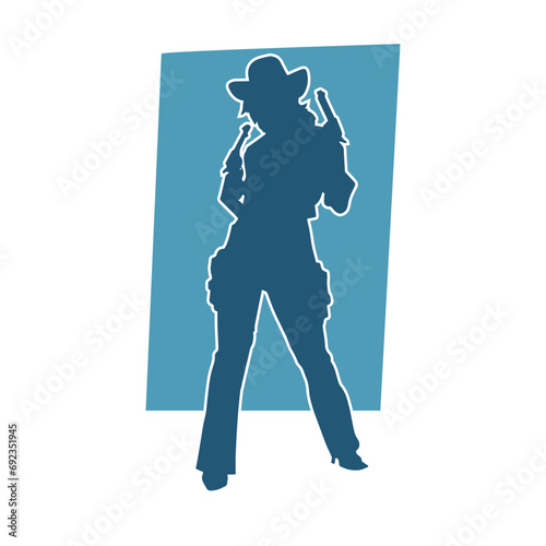 Silhouette of a female in cow girl costume holding a pistol gun.