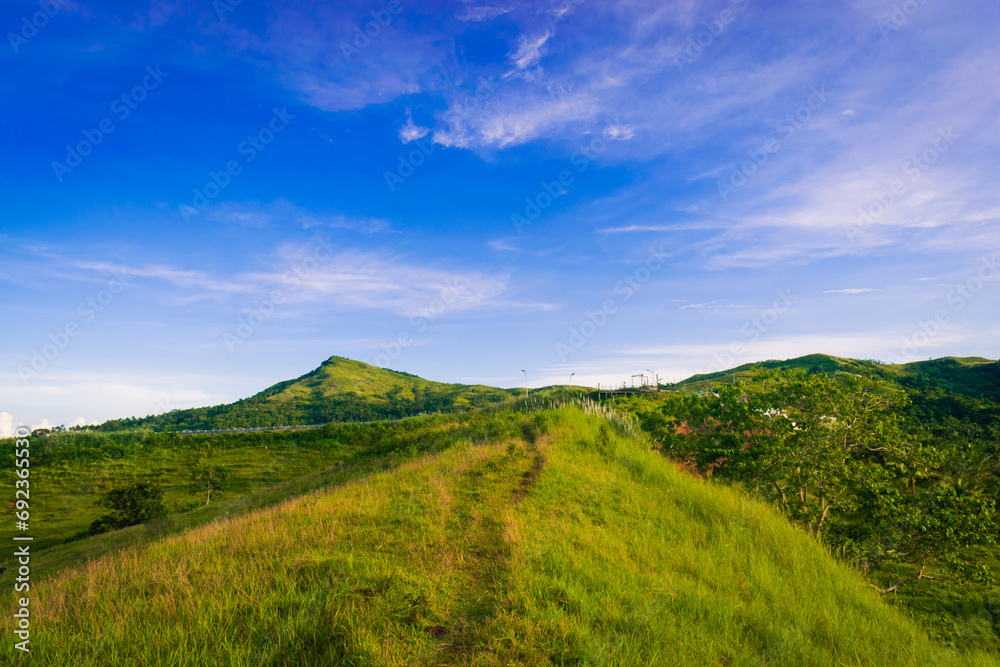 Landscape with mountains and blue sky. Cabaliwan Peak, Romblon, Philippines.