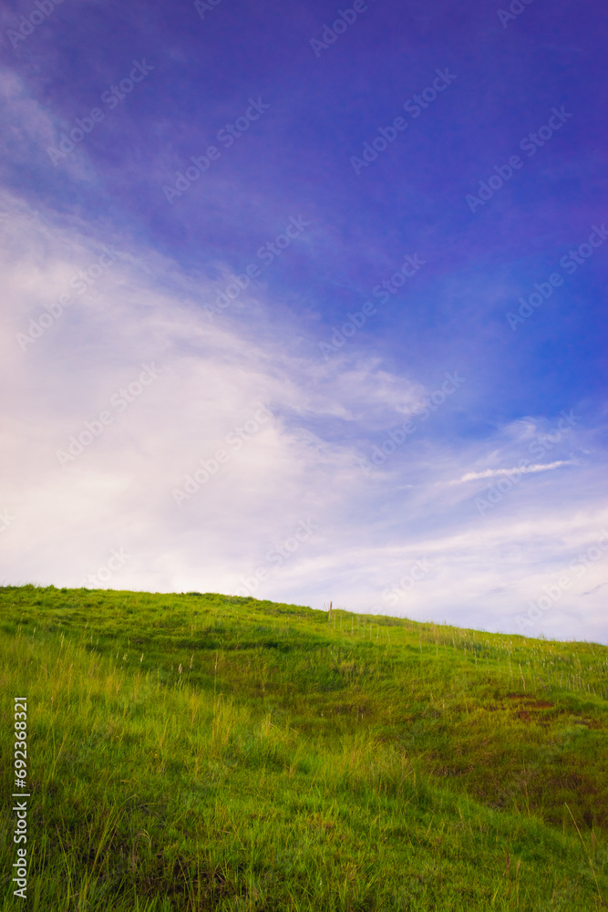 Landscape with mountains and blue sky. Portrait. Cabaliwan Peak, Romblon, Philippines.