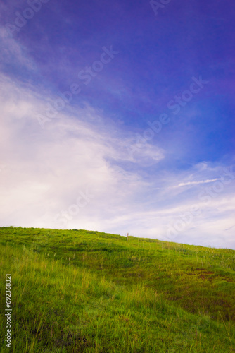 Landscape with mountains and blue sky. Portrait. Cabaliwan Peak, Romblon, Philippines.