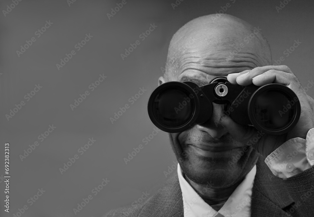 looking through binoculars with white background with people stock photo looking through binoculars with white background with people stock photo