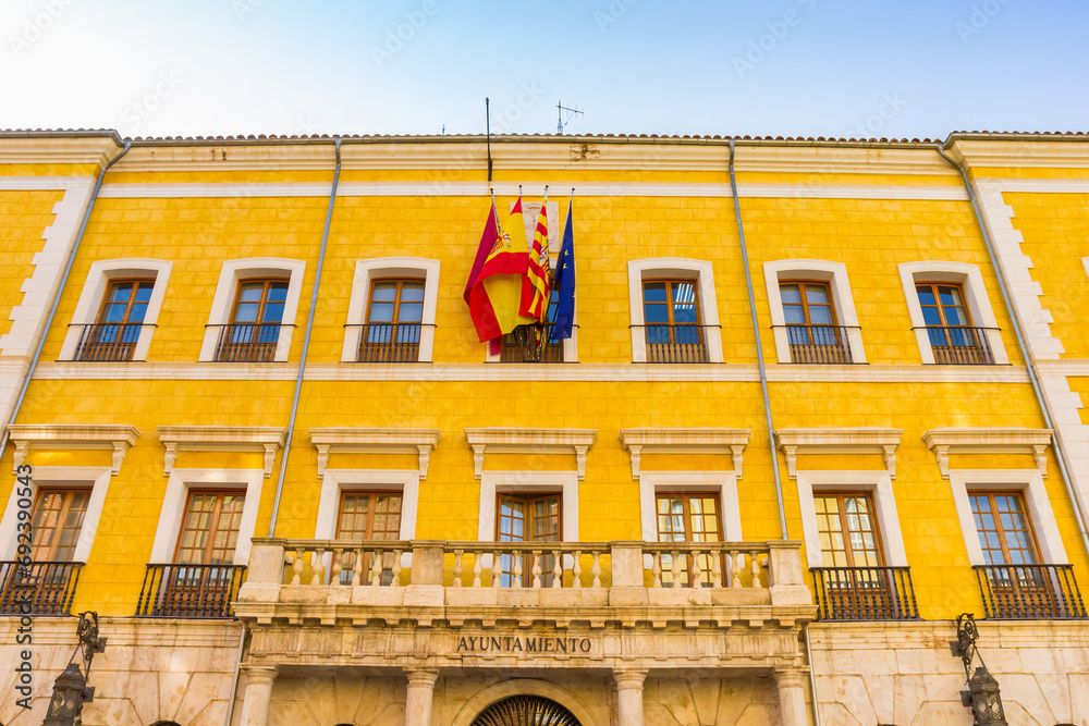 Yellow facade of the historic town hall building of Teruel, Spain