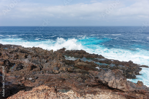 The Atlantic Ocean and rocky coast of in the north of Tenerife near Buenavista del Norte. Spain. Canary Islands photo