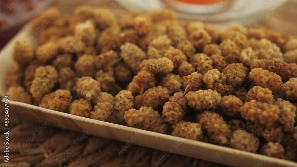 Dried mulberry on the table close up. Dried mulberry on the table close up.