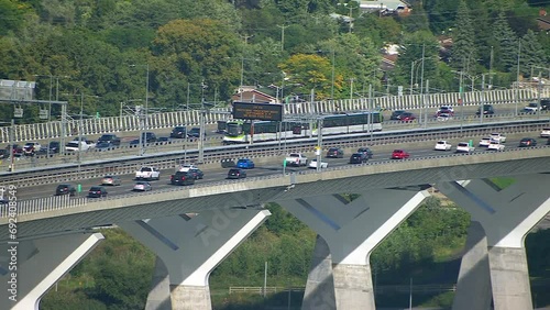 Traffic on Samuel De Champlain bridge in Brossard, Quebec, Helicopter Aerial View photo