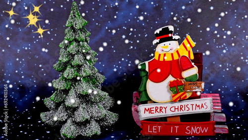 Santa Claus with text Merry Christmas and snowy fir tree