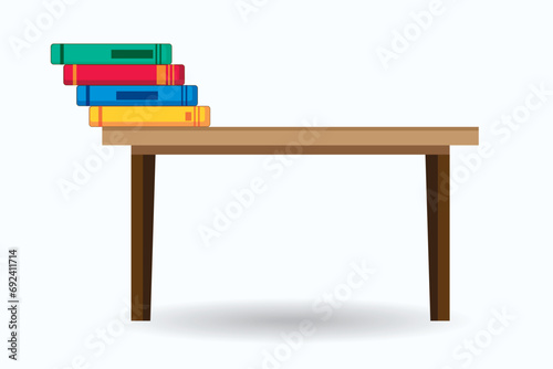 Books on the table. Physics, balance, flexibility, falling, movement, momentum, speed. photo