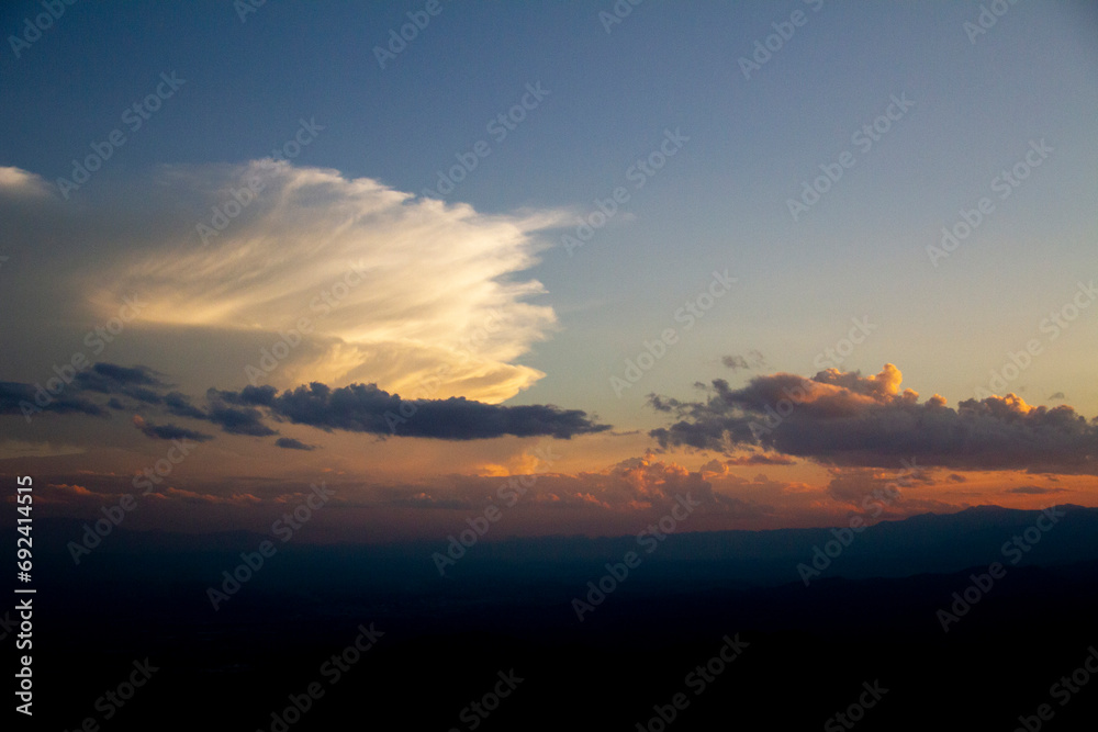 Mountains and evening sky sunset background panorama concept. Skyline top view Evening sunset sky and the morning sunrise colorful with copy space.
