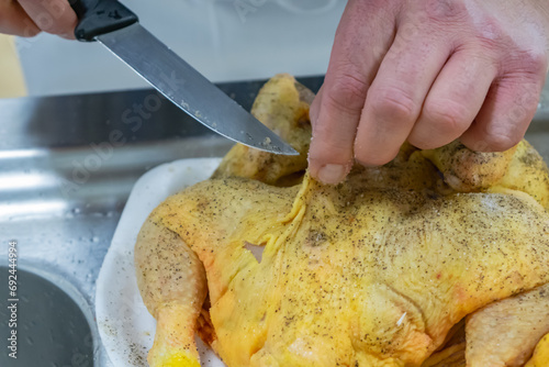 chef preparing chicken photo