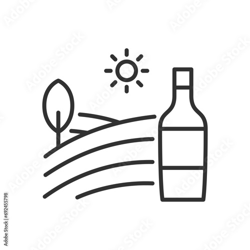 Wine field, linear icon. A field of grapes and a bottle. Line with editable stroke photo
