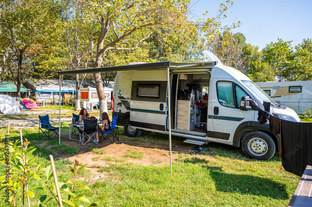 Family camping with a campervan in campsites in Greece or Croatia. Family camping with a campervan in campsites in Greece or Croatia.