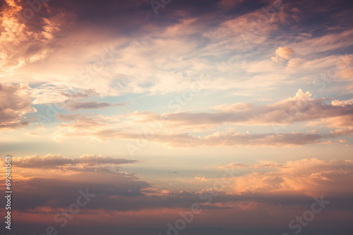 Orange cloudscape and dramatic dreamy sky, sunset clouds skyline