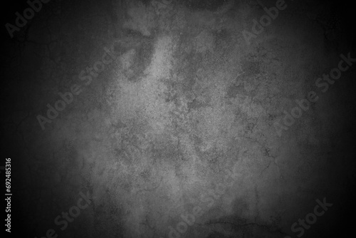 Old wall texture cement dark black gray background abstract grey color design are light with white gradient background. photo