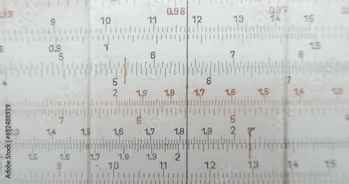 old slide rule slipstick analogue computer for mathematical calcululs, top view photo