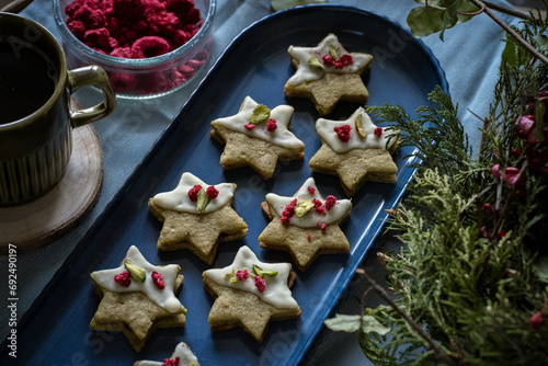 Christmas pistachio butter sweets with dehydrated raspberries, vykrajované cukroví,  czech xmas candy, star shape, linecké, freeze dryied fruit photo