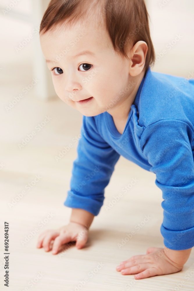 Cute, crawling and smile with baby on floor for child development, learning and youth. Young, curious and adorable with infant kid on ground of family home for growth, progress and first steps Cute, crawling and smile with baby on floor for child development, learning and youth. Young, curious and adorable with infant kid on ground of family home for growth, progress and first steps