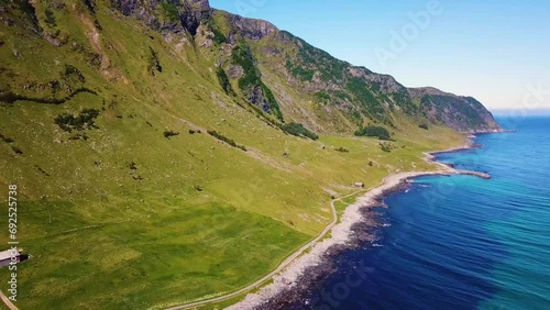 Aerial view of the Norwegian Sea coastline in summer, camera rotates left, Norway, Refviksanden beach
 photo