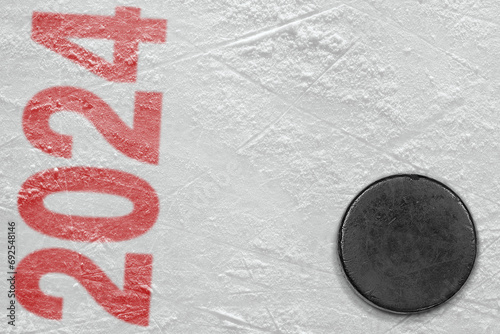 Hockey puck on ice arena