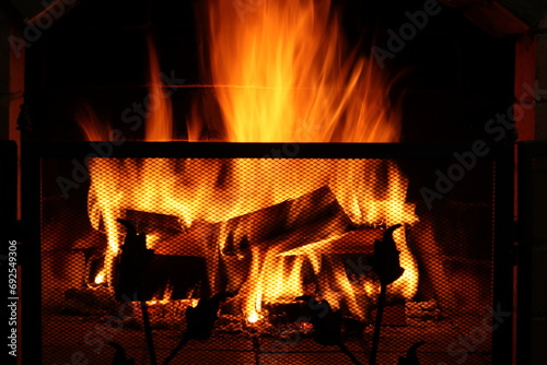 Metal screen with mesh to protect against fire sparks from the fireplace