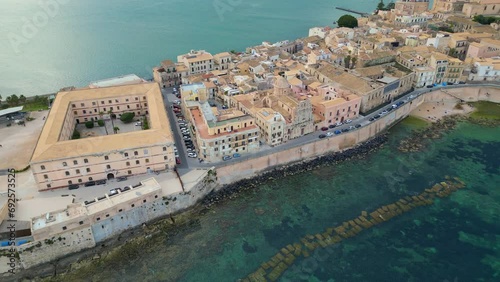 Syracuse, Sicily, Ortigia island, Etna volcano, UNESCO Italy. Europe heritage, Ortygia Historical centre, Piazza Duomo, Cityscape drone Aerial view of Castello Maniace citadel from above