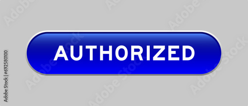 Blue color capsule shape button with word authorized on gray background