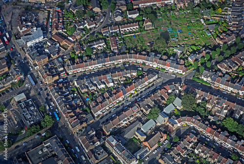 Aerial view of terraced housing in East London with allotment.  © allan