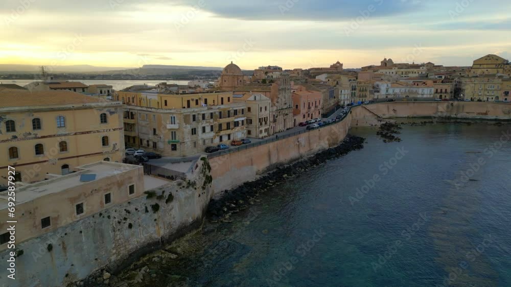 Syracuse, Sicily, Ortigia island, Etna volcano, UNESCO Italy. Europe heritage, Ortygia Historical centre, Piazza Duomo, Cityscape drone Aerial view of Castello Maniace citadel from above Syracuse, Sicily, Ortigia island, Etna volcano, UNESCO Italy. Europe heritage, Ortygia Historical centre, Piazza Duomo, Cityscape drone Aerial view of Castello Maniace citadel from above