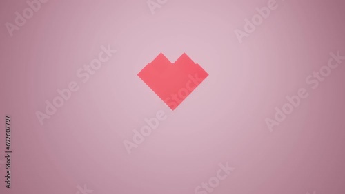The pixelated red heart gradually turns into a pixel. Abstract background. High quality FullHD footage