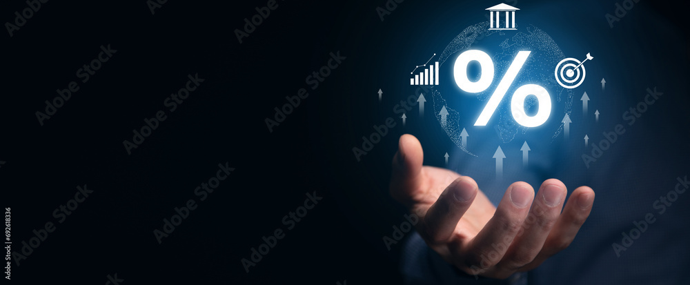 Businessman touching percent symbol with arrows Businessman touching percent symbol with arrows