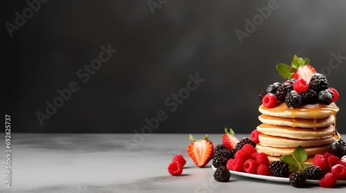 Pancakes with fresh berries on white marble table, copy space