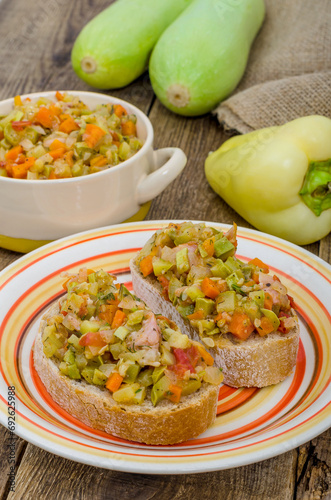Sandwiches with fresh vegetable stew on the kitchen table