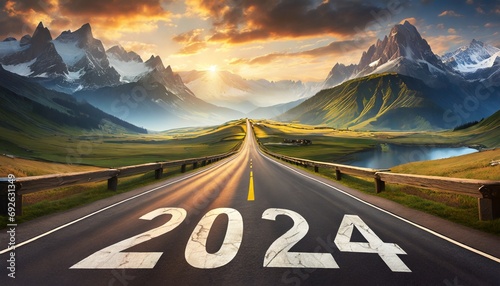 Road to the mountains with 2024 written on the road 