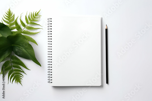 Notebook with Plant and Pencil
